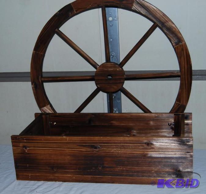 lot 24 image: Pair of Wagon Wheel Planters, new....