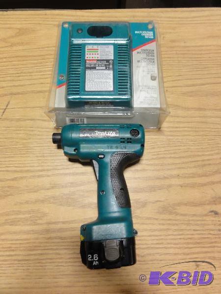 lot 5062 image: (1) Makita Model 6798FD 9.6V Driver with batt...