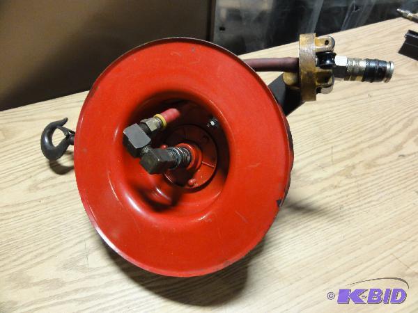 lot 5067 image: Retractable Hose Reel with approx 10 feet of ...