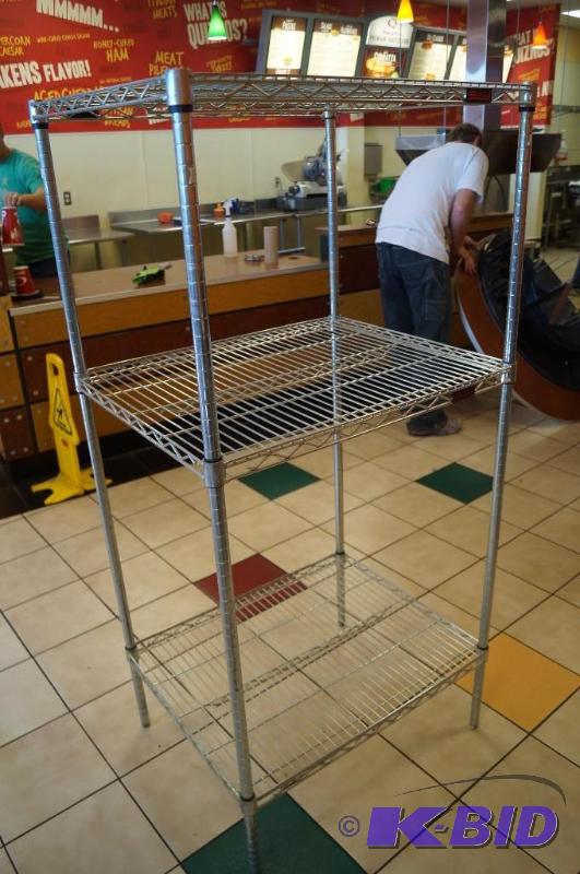 lot 36 image: Chrome wire display shelves