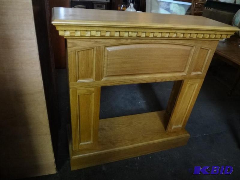 Electric fire place with a nice oak mantle
