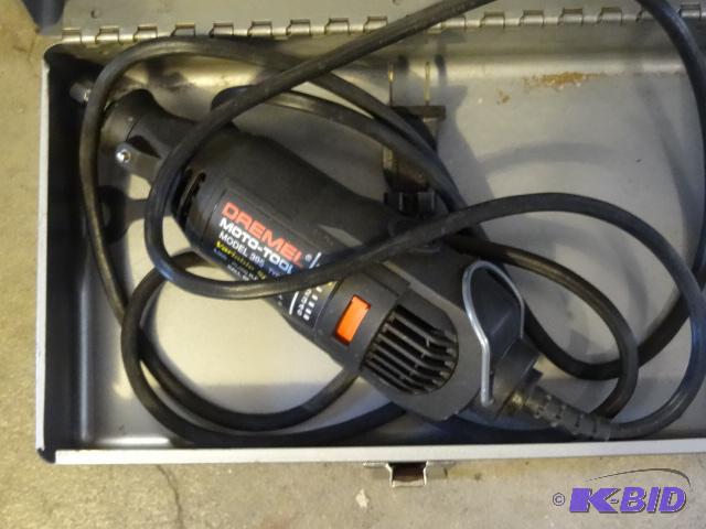 lot 28 image: Dremel Moto Tool 395 In Metal Case...