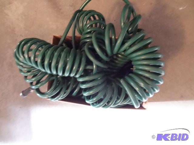 lot 338 image: Box of coiled garden hose...