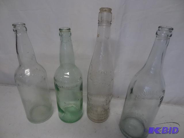 lot 115 image: 4 embossed bottles...