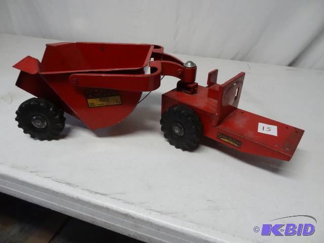 lot 15 image: Vintage Structo Rocker #310. Missing cab...