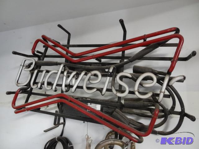 lot 153 image: Budweiser neon. Does not light up...