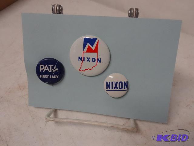 lot 190 image: Nixon pins...