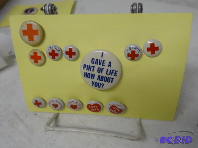lot 200 image: Red cross pins...