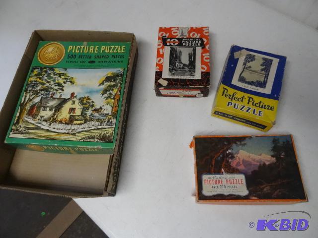 lot 32 image: 4 vintage jigsaw puzzles...