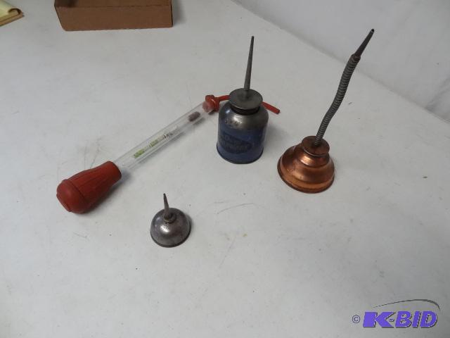 lot 48 image: 3 oil cans. Anti freeze tester...
