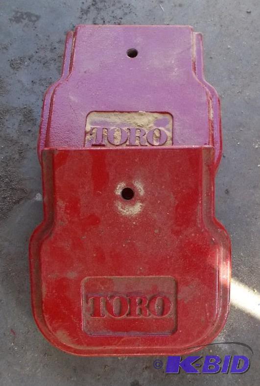 lot 36 image: Set of  - 4 Toro Brand Lawn Mower Weight...