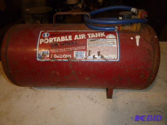 lot 21 image: Midwest Portable Air Tank 7 gallon....