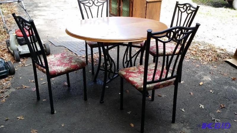 Table and chairs, wrought iron base, wood tab...