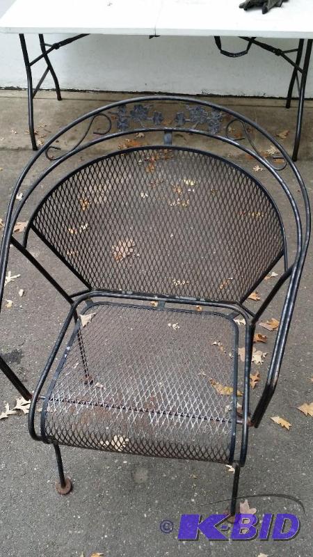 Wroght iron black patio chair...