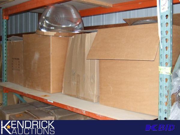 One Shelf of Approximately 30 Various New 22 Dome PMMA Reflector Coverings