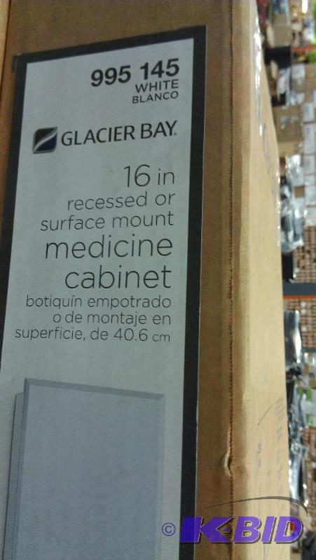 lot 104 image: White 16" Medicine Cabinet. Glacier Bay....