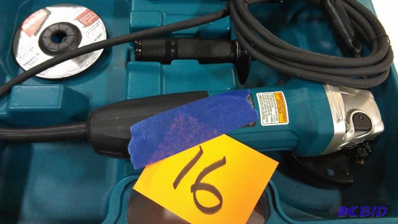 lot 16 image: Makita 4" Angle Grinder with case and on...