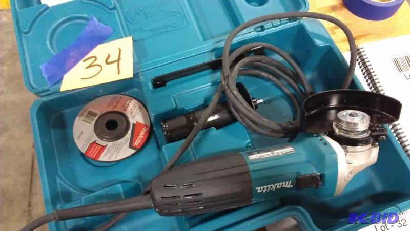 lot 34 image: Makita 4" Angle Grinder with case and on...