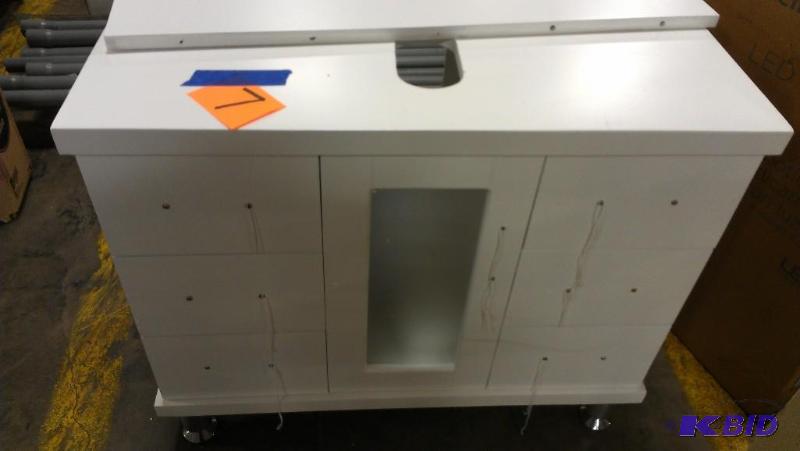 lot 7 image: White Vanity Cabinet with backsplash, directi...