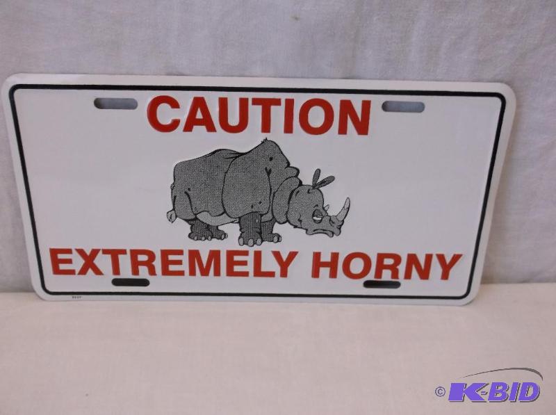 lot 43 image: Collectable embossed license plate sign....