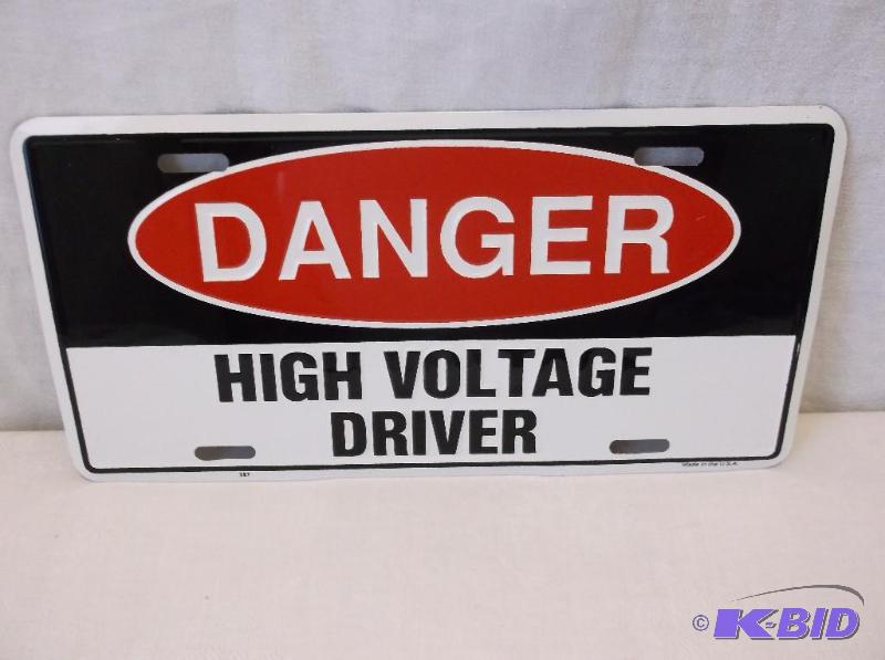 lot 50 image: Collectable embossed license plate sign....