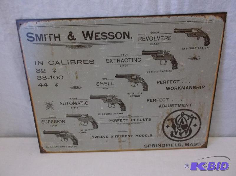 lot 57 image: Collectable Smith & Wesson metal sign mea...
