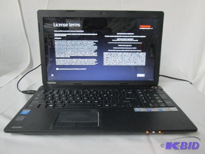 lot 3 image: Toshiba Satellite 15.6 4GB Windows 8 Laptop