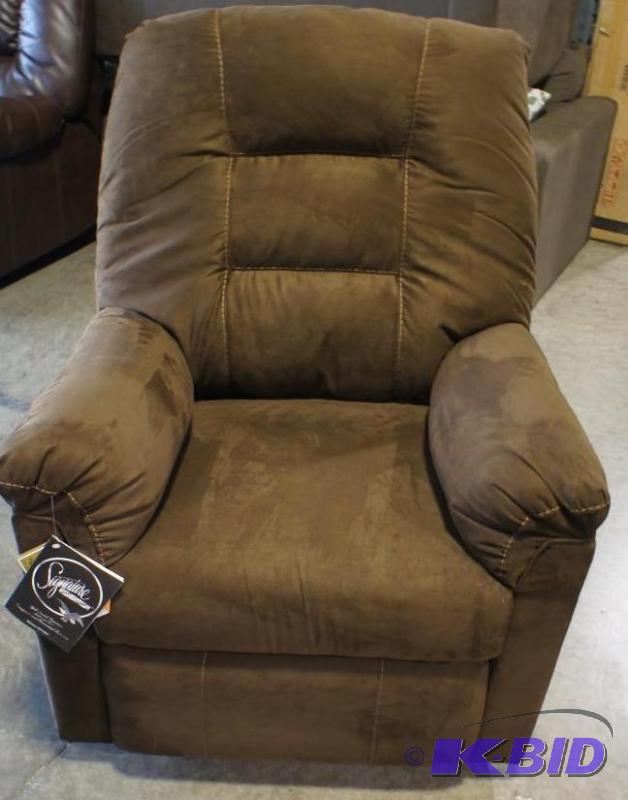 New Ashley Signature Rocker Recliner. Chocola...