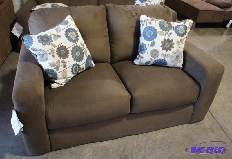 New Ashley Furniture Loveseat with pillows. C...
