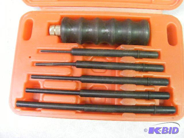 lot 104 image: Punch Kit...