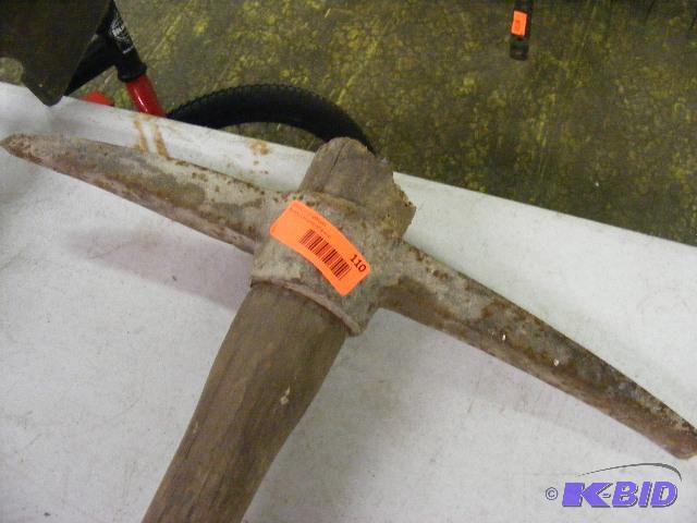 lot 110 image: older pick axe...