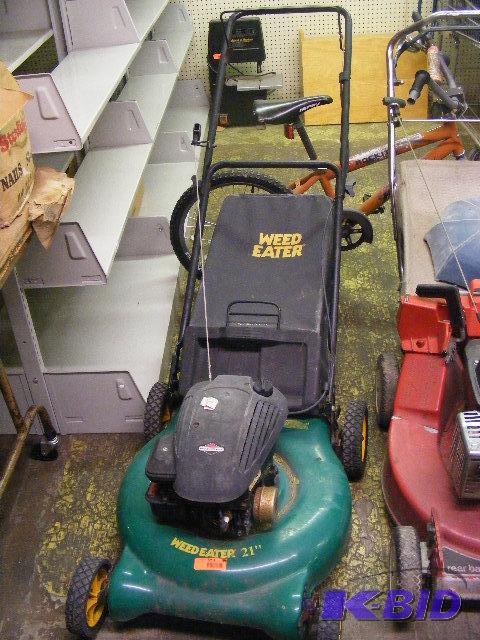 lot 594 image: Weed Eater Lawn Mower with Bagger attachment....