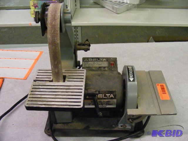 lot 74 image: Delta Sander with 1 belt and side disc. 14...