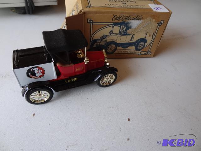 lot 121 image: Ertl 1918 Ford Runabout diecast bank. Florida...