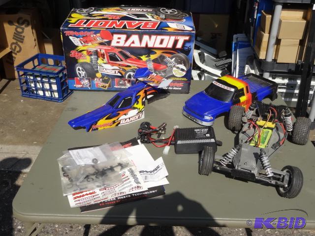 lot 142 image: Bandit electric remote car. No controller. 7....
