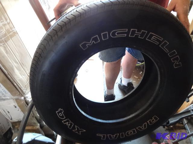 lot 153 image: 2 tires. Face is starting to crack...