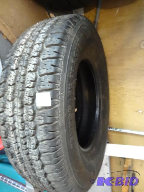lot 155 image: Firestone tire. R22570R15. New tread...