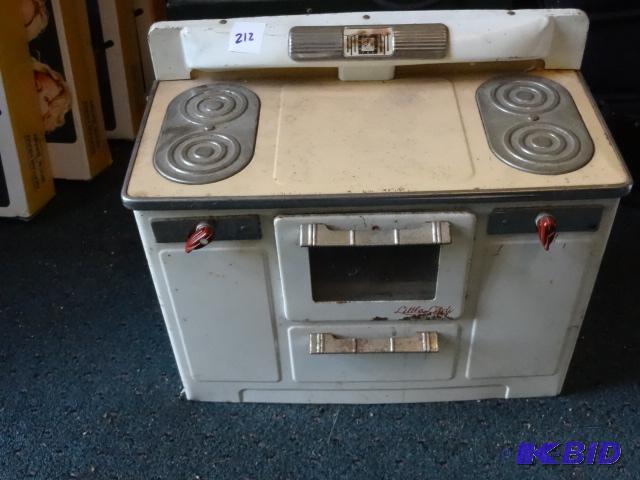 lot 212 image: Vintage little lady metal play stove...