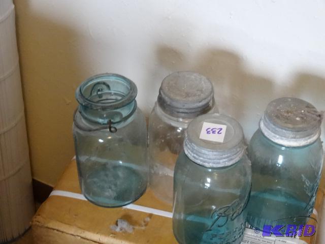 lot 233 image: 4 vintage canning jars. 3 blue ball and 1 cle...