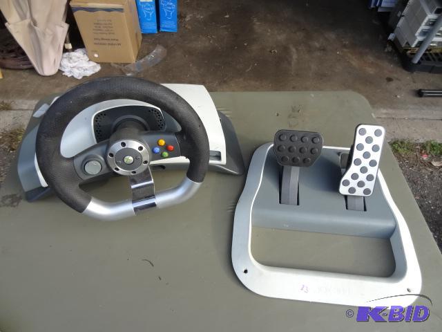 lot 24 image: X box 360 wireless racing wheel and pedal set...