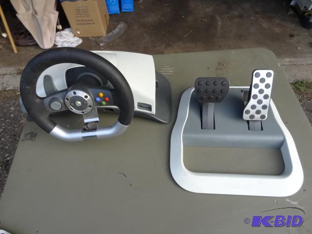 lot 25 image: X box 360 wireless racing wheel and pedal set...
