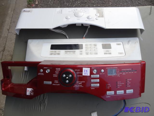 lot 28 image: Oven, washer, and dryer control panels...