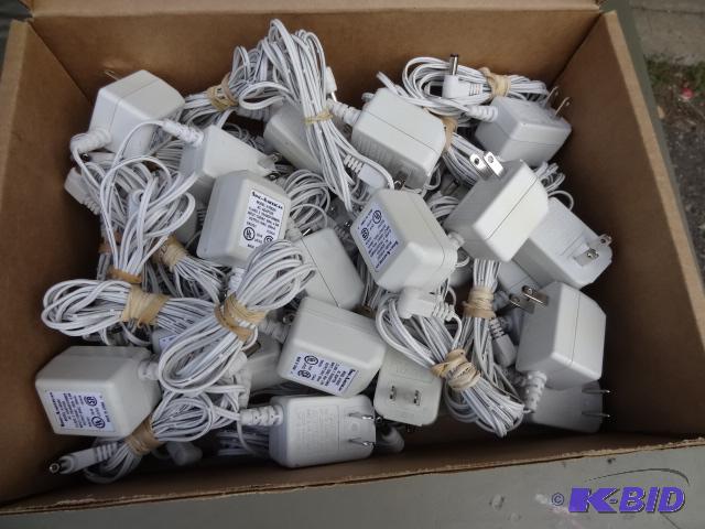 lot 32 image: 9V AC 200 MA power supplies. Approx 25....