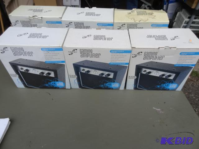 lot 60 image: Qty 6 first act gaming amplifiers. NIB...