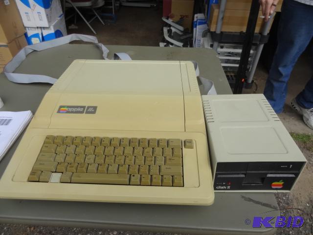 lot 79 image: Apple IIE and disk drive...