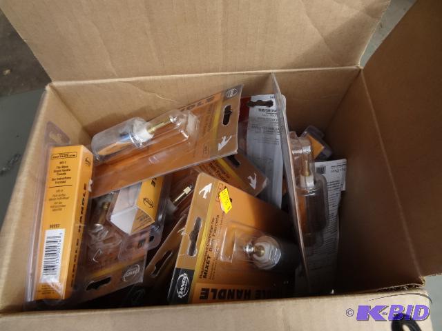 lot 85 image: Box of misc faucet replacemnet cartridges...