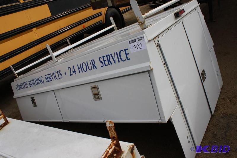 lot 303 image: Pickup Truck Topper with utility storage met...