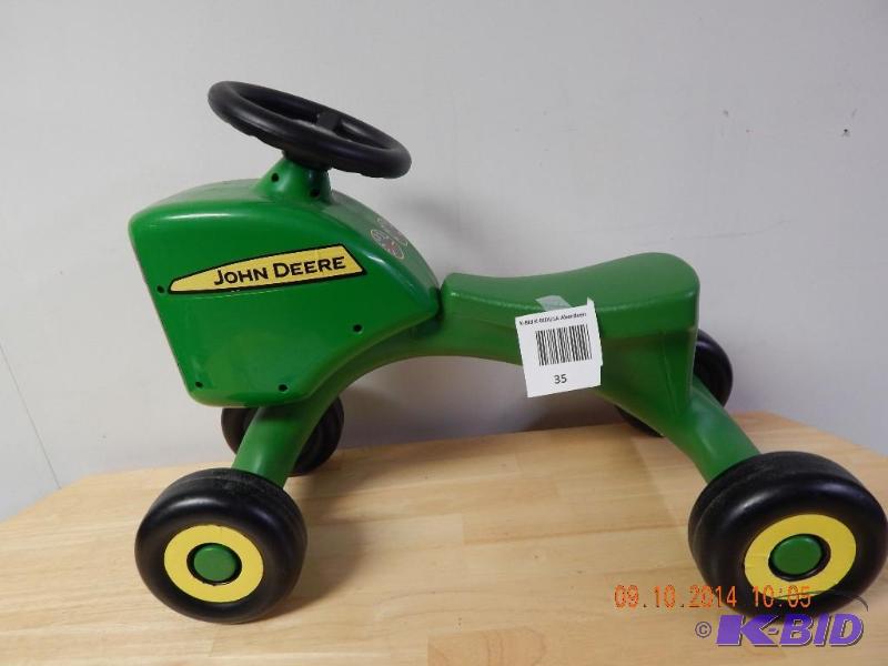 lot 35 image: John Deere plastic ridingpush &nbsptoy....