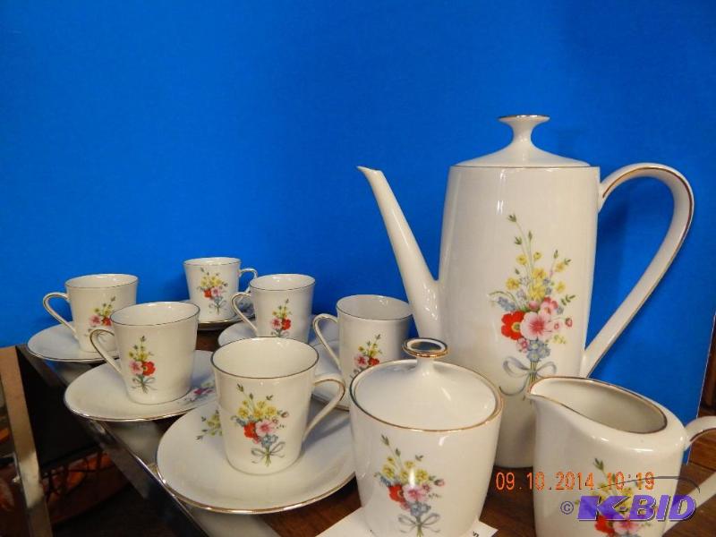 lot 40 image: German china tea set includes 6 cups and sauc...