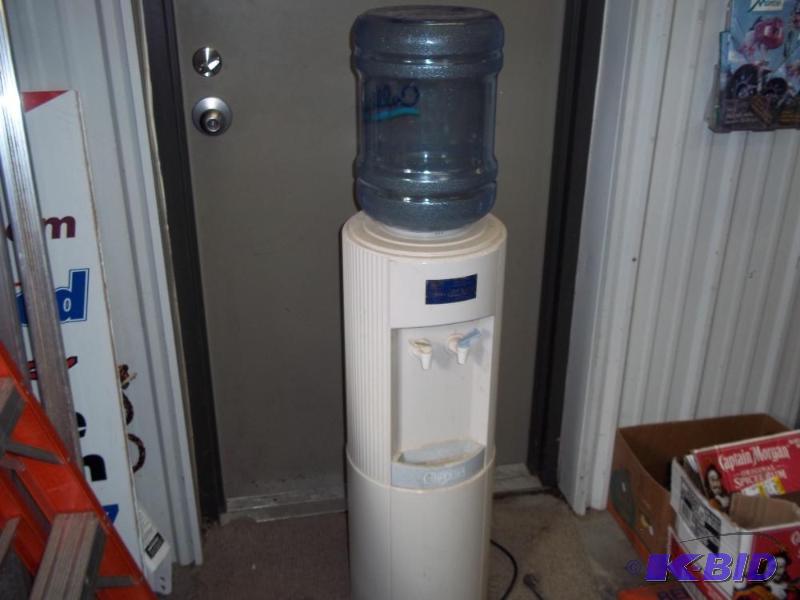 lot 29 image: Hot and Cold Water Cooler  Heater, bottle no...